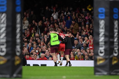 210226 - Wales v Scotland - Guinness Men's Six Nations - Sam Costelow of Wales leaves the field injured