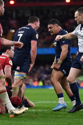 210226 - Wales v Scotland - Guinness Men's Six Nations - Sione Tuipulotu and Rory Darge of Scotland celebrates after George Turner of Scotland pushes the ball over to score a try
