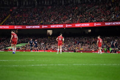 210226 - Wales v Scotland - Guinness Men's Six Nations - Eddie James of Wales, Joe Hawkins of Wales and Sam Costelow of Wales