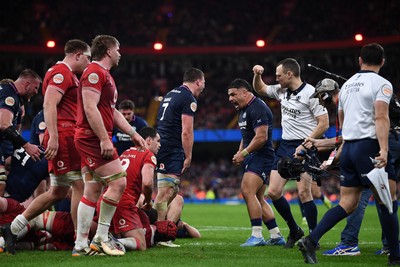 210226 - Wales v Scotland - Guinness Men's Six Nations - Sione Tuipulotu of Scotland celebrates scoring a try after George Turner of Scotland pushes the ball over to score a try