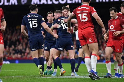 210226 - Wales v Scotland - Guinness Men's Six Nations - Finn Russell of Scotland celebrates scoring a try with team mates