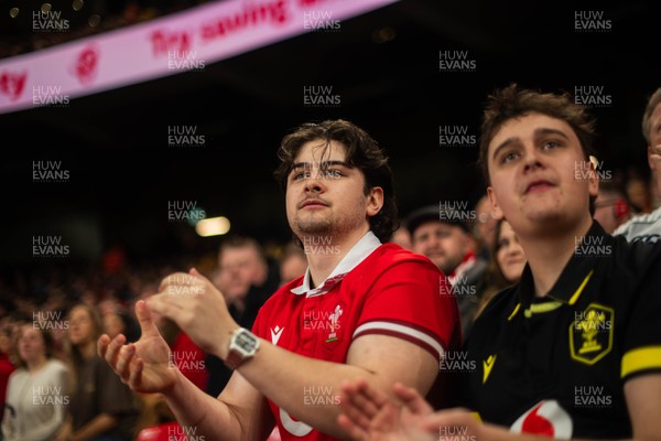 210226 - Wales v Scotland - Guinness Six Nations - Fans react inside the Stadium during the match 