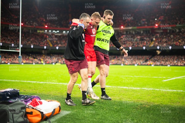 210226 - Wales v Scotland - Guinness Six Nations - Sam Costellow of Wales is carried off injured during the game
