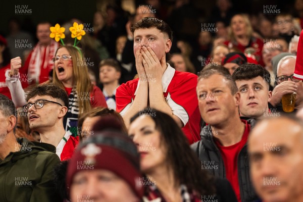 210226 - Wales v Scotland - Guinness Six Nations - Fans react inside the Stadium during the match 