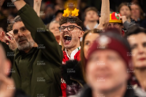 210226 - Wales v Scotland - Guinness Six Nations - Fans react inside the Stadium during the match 