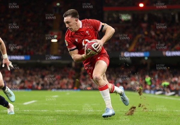 210226 - Wales v Scotland - Guinness Six Nations Championship - Josh Adams of Wales runs in to score a try