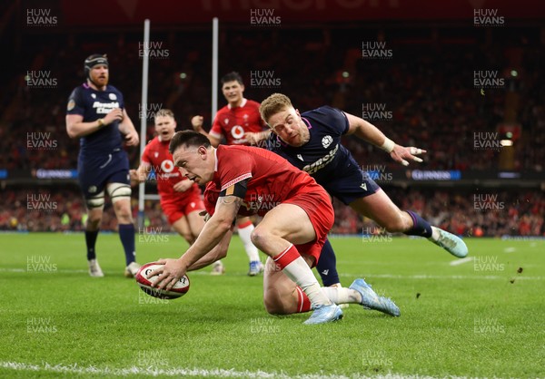 210226 - Wales v Scotland - Guinness Six Nations Championship - Josh Adams of Wales runs in to score a try
