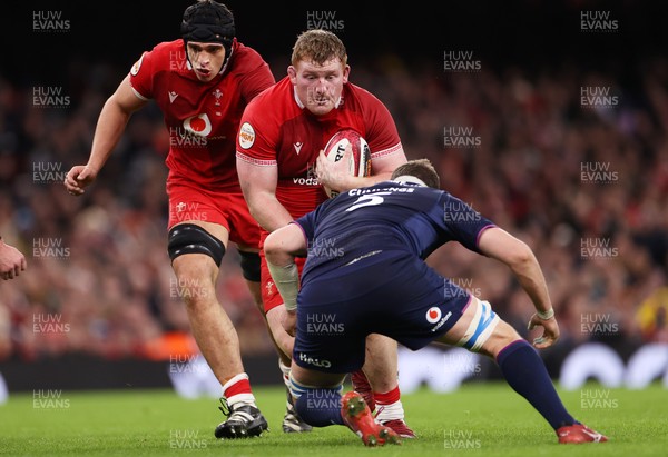 210226 - Wales v Scotland - Guinness Six Nations Championship - Rhys Carre of Wales is tackled by Scott Cummings of Scotland 