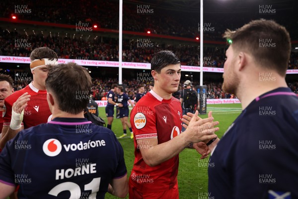 210226 - Wales v Scotland - Guinness Six Nations Championship - Louis Rees-Zammit of Wales shakes hands with the opposition at full time