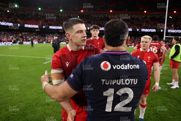 210226 - Wales v Scotland - Guinness Six Nations Championship - Joe Hawkins of Wales and Sione Tuipulotu of Scotland at full time