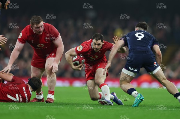 210226 - Wales v Scotland, 2026 Guinness Six Nations - Tomos Williams of Wales takes on Ben White of Scotland