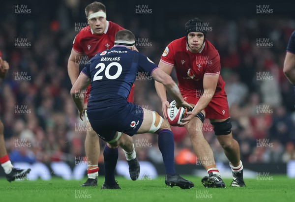210226 - Wales v Scotland, 2026 Guinness Six Nations - Dafydd Jenkins of Wales takes on Josh Bayliss of Scotland
