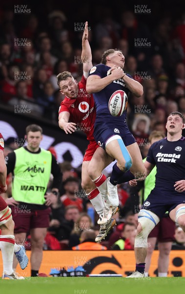 210226 - Wales v Scotland, 2026 Guinness Six Nations - Sam Costelow of Wales and Duhan van der Merwe of Scotland compete for the ball