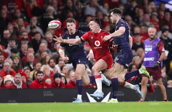 210226 - Wales v Scotland, 2026 Guinness Six Nations - Josh Adams of Wales looks to take the ball