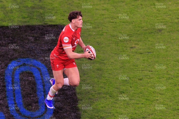 210226 - Wales v Scotland - Guinness Six Nations - Eddie James of Wales looks for a gap