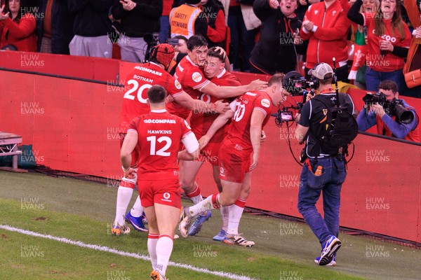 210226 - Wales v Scotland - Guinness Six Nations - Josh Adams of Wales celebrates after scoring a try