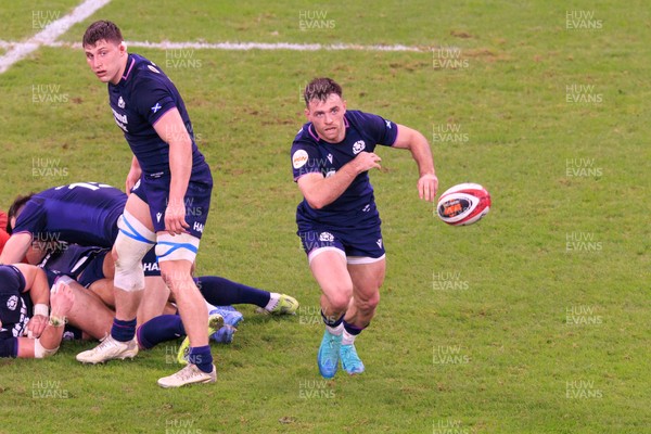 210226 - Wales v Scotland - Guinness Six Nations - Ben White of Scotland passes the ball