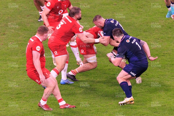 210226 - Wales v Scotland - Guinness Six Nations - Matt Fagerson of Scotland is tackled
