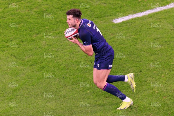 210226 - Wales v Scotland - Guinness Six Nations - Blair Kinghorn of Scotland on the attack