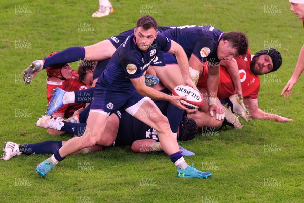 210226 - Wales v Scotland - Guinness Six Nations - Ben White of Scotland passes the ball
