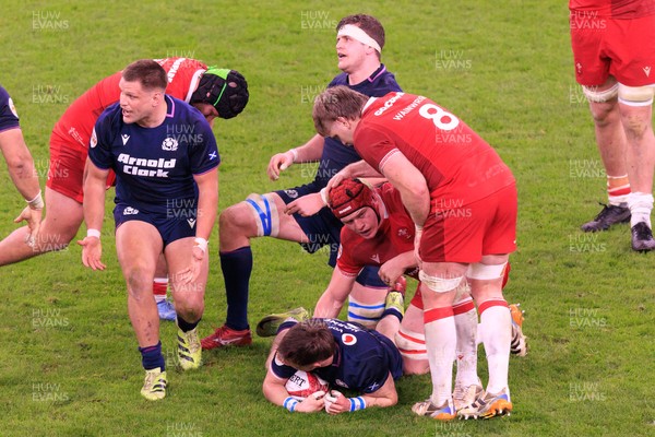 210226 - Wales v Scotland - Guinness Six Nations - Aaron Wainwright of Wales congratulates James Botham after winning a turnover
