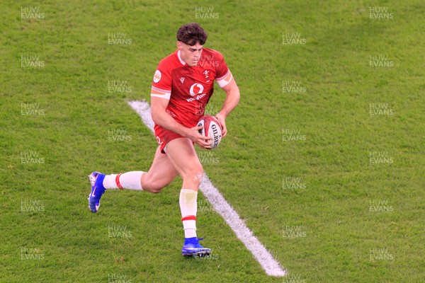 210226 - Wales v Scotland - Guinness Six Nations - Eddie James of Wales makes a break