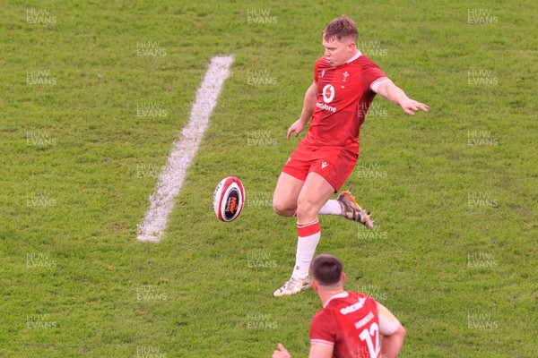 210226 - Wales v Scotland - Guinness Six Nations - Sam Costelow of Wales kicks the ball