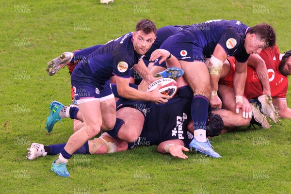 210226 - Wales v Scotland - Guinness Six Nations - Ben White of Scotland passes the ball