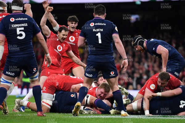 210226 - Wales v Scotland - Guinness Men's Six Nations - Rhys Carre of Wales scores the first try of the game