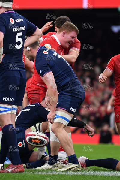 210226 - Wales v Scotland - Guinness Men's Six Nations - Rhys Carre of Wales scores the first try of the game