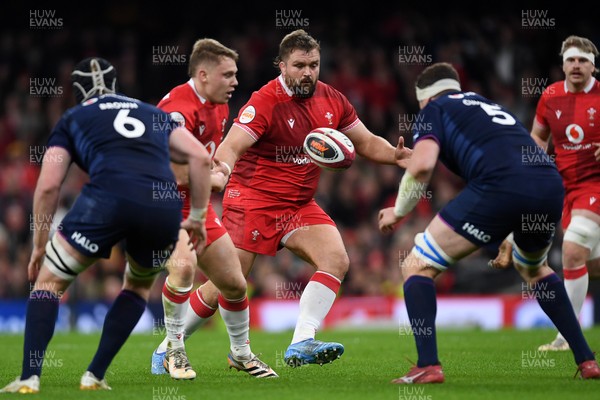 210226 - Wales v Scotland - Guinness Men's Six Nations - Tomas Francis of Wales is challenged by Scott Cummings of Scotland