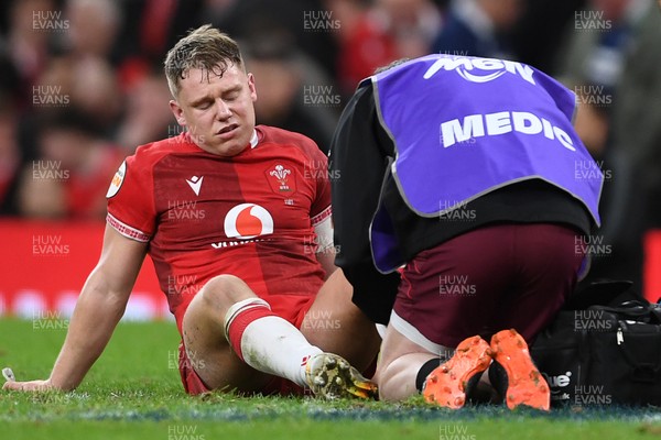 210226 - Wales v Scotland - Guinness Men's Six Nations - Sam Costelow of Wales leaves the field injured