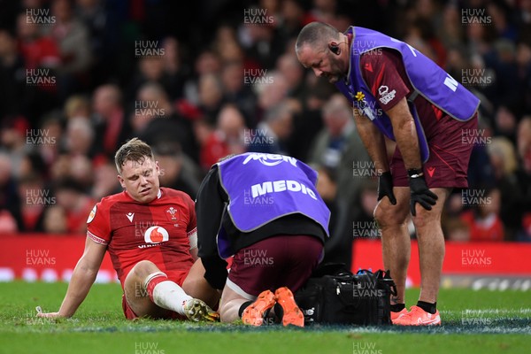210226 - Wales v Scotland - Guinness Men's Six Nations - Sam Costelow of Wales leaves the field injured