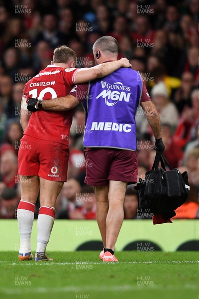 210226 - Wales v Scotland - Guinness Men's Six Nations - Sam Costelow of Wales leaves the field injured