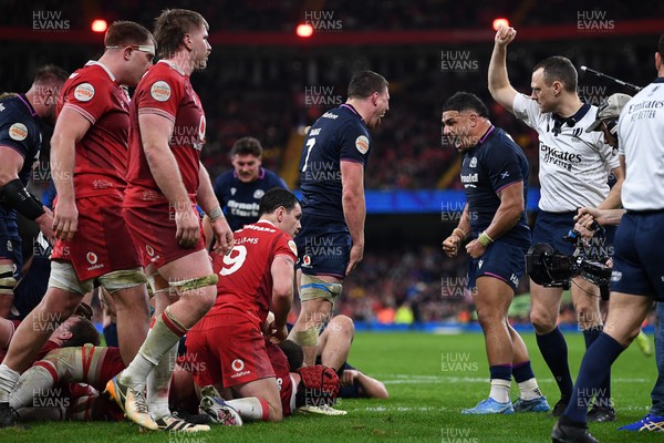 210226 - Wales v Scotland - Guinness Men's Six Nations - Sione Tuipulotu and Rory Darge of Scotland celebrates after George Turner of Scotland pushes the ball over to score a try