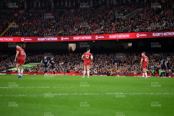 210226 - Wales v Scotland - Guinness Men's Six Nations - Eddie James of Wales, Joe Hawkins of Wales and Sam Costelow of Wales