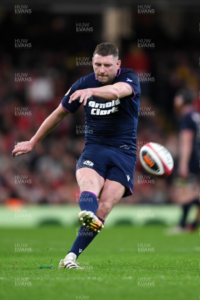 210226 - Wales v Scotland - Guinness Men's Six Nations - Finn Russell of Scotland kicks the conversion