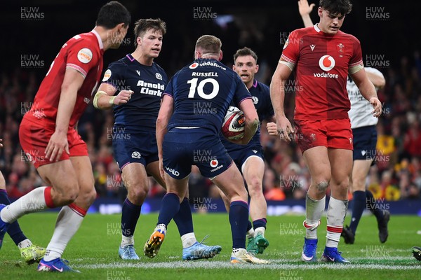 210226 - Wales v Scotland - Guinness Men's Six Nations - Finn Russell of Scotland celebrates scoring a try with team mates