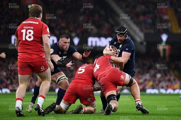 210226 - Wales v Scotland - Guinness Men's Six Nations - Max Williamson of Scotland is challenged by Dafydd Jenkins of Wales