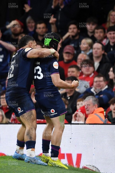 210226 - Wales v Scotland - Guinness Men's Six Nations - Darcy Graham of Scotland scores a try with team mates