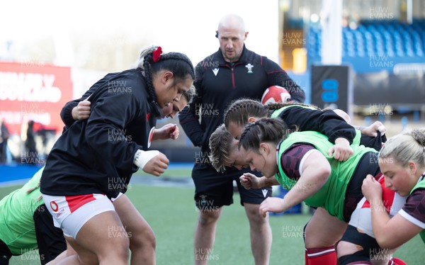 230324 - Wales v Scotland, Guinness Women’s 6 Nations - Mike Hill, Wales Women forwards coach, works with the pack during warm up