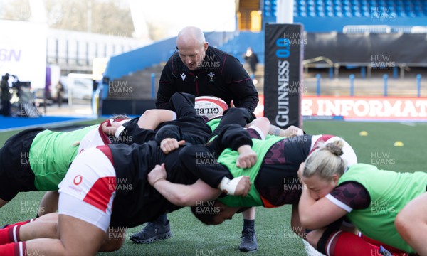 230324 - Wales v Scotland, Guinness Women’s 6 Nations - Mike Hill, Wales Women forwards coach, works with the pack during warm up
