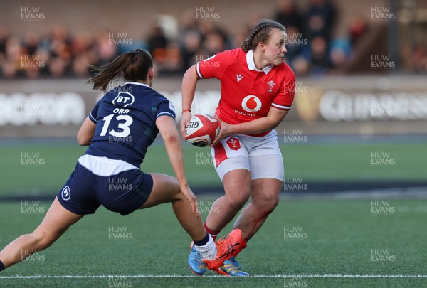230324 - Wales v Scotland, Guinness Women’s 6 Nations - Lleucu George of Wales feeds the ball out
