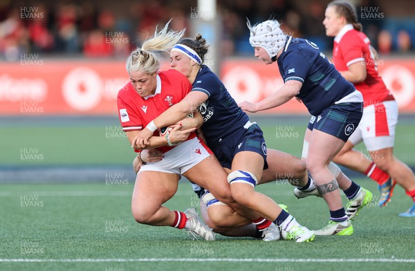 230324 - Wales v Scotland, Guinness Women’s 6 Nations - Kelsey Jones of Wales is tackled
