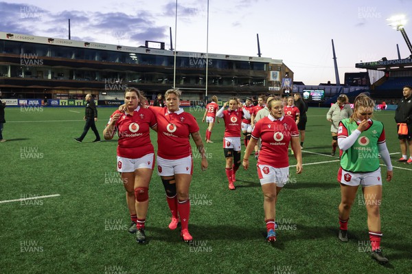230324 - Wales v Scotland, Guinness Women’s 6 Nations - Gwenllian Pyrs of Wales, Donna Rose of Wales, Lleucu George of Wales and Niamh Terry of Wales leave the pitch at the end of the match