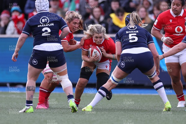 230324 - Wales v Scotland, Guinness Women’s 6 Nations - Alex Callender of Wales takes on Sarah Bonar of Scotland