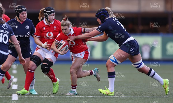230324 - Wales v Scotland, Guinness Women’s 6 Nations - Keira Bevan of Wales takes on Sarah Bonar of Scotland