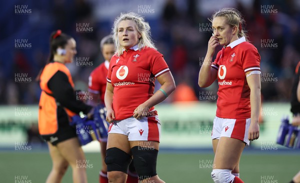 230324 - Wales v Scotland, Guinness Women’s 6 Nations - Alex Callender of Wales and Hannah Jones of Wales wait for a decision on Callender’s try