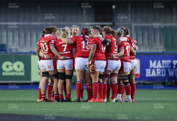 230324 - Wales v Scotland, Guinness Women’s 6 Nations - Wales huddle together at the end of the match
