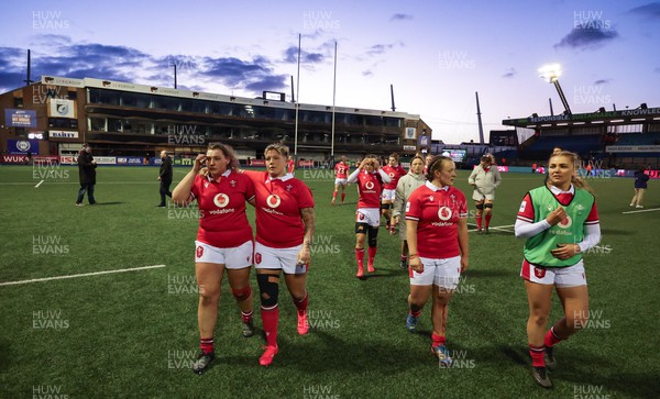 230324 - Wales v Scotland, Guinness Women’s 6 Nations - Gwenllian Pyrs of Wales, Donna Rose of Wales, Lleucu George of Wales and Niamh Terry of Wales leave the pitch at the end of the match